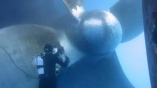 THE UNDERWATER HULL CLEANING AND PROPELLER POLISHING FOR THE VESSEL AT VUNG TAU ANCHORAGE